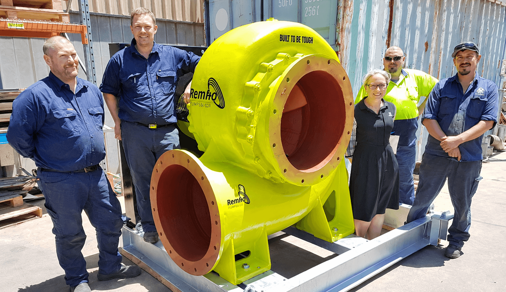 Workers-Gather-Around-Remko-Industrial-Pump